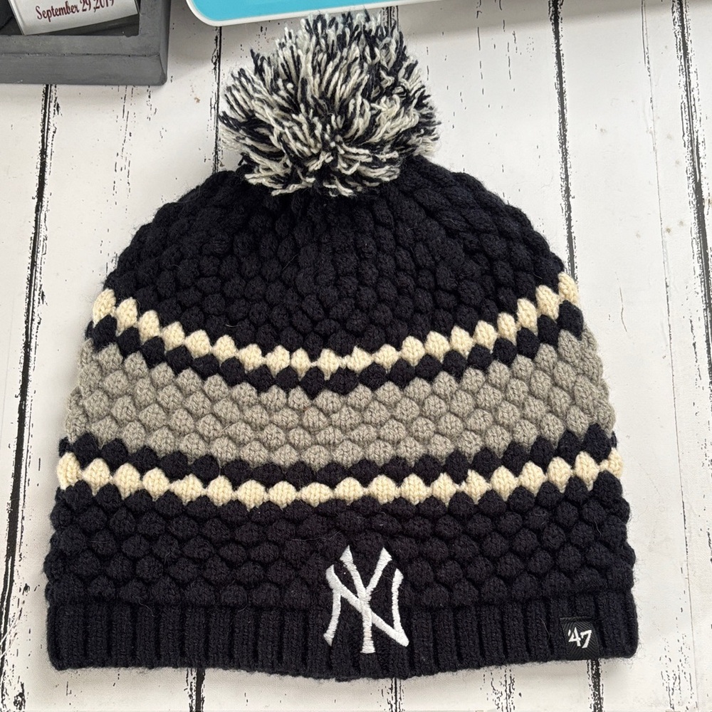 Women’s New York Yankees beanie with Pom. New without tags. Official